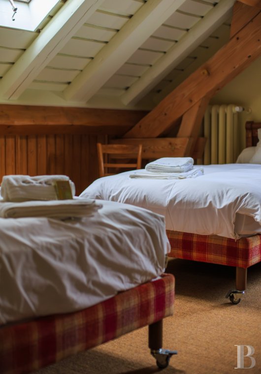 A former livestock farm which has been transformed into a vast, comfortable home near to Nantua in the Haut-Bugey region - photo  n°34